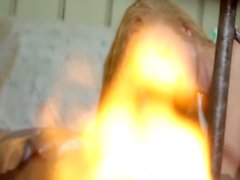 Young lesbo using a dildo in her solo masturbation