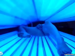 teen latina college student gives lesbian pussy a massage in tanning bed