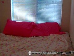 Redhead teen uses a purple toy in her bedroom