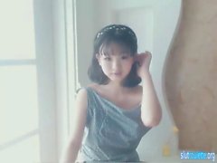 adorable petite japanese babe shows her cute boobs