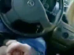 Horny GF blows her man's cock while driving