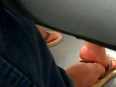 Real hidden foot with woman in bus , she likes