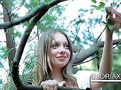 Cute teen Gloria rubbing her pussy outdoor