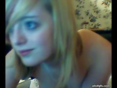 Pretty blonde teen teasing in front of the webcam