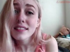 Blonde teen slut plays with a toy banana