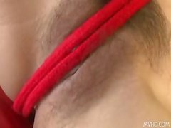 Suzuka plays with her sweet pussy with a red nylon rope as she moans and groans