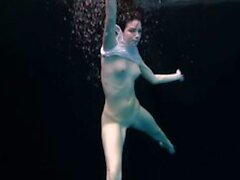 Sexy chicks swim nude underwater