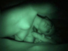 Nightcam captures a beauty masturbating passionately