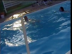 Pool side orgy with hot young coeds fucking and sucking large dicks