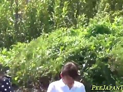 Wild asian teens pissing outdoors