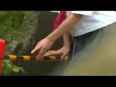 Teen makes outdoor fingering